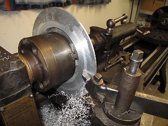  Running in open belt, about 258 rpm, we take light cuts from the inside working out with a nice sharp high-speed toolbit.